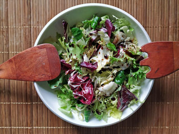 High angle view of chopped vegetables in bowl on table