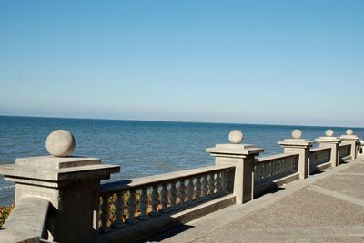 Scenic view of calm sea against clear sky