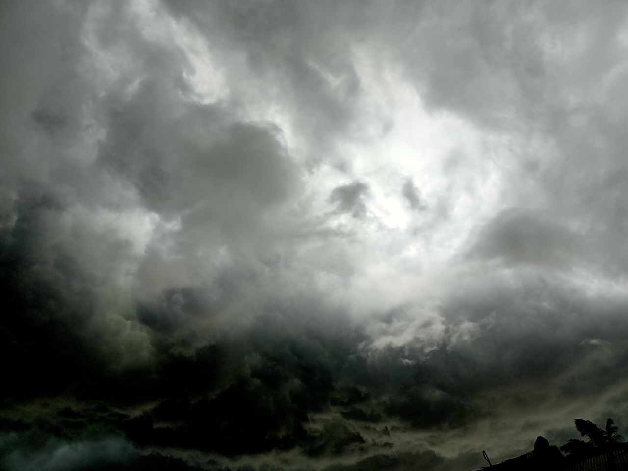 LOW ANGLE VIEW OF STORM CLOUDS OVER CLOUD