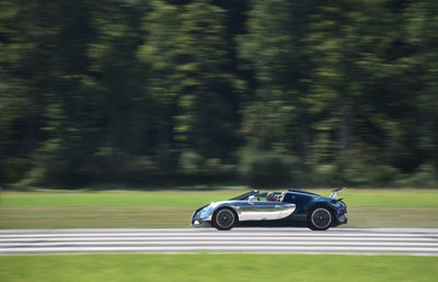 Blurred motion of car on road