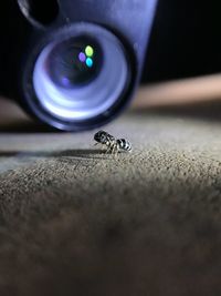 Close-up of camera on table