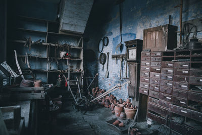 Rear view of man standing in factory