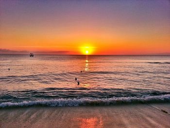 Scenic view of sea at sunset