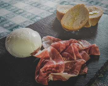 High angle view of meat in plate on table