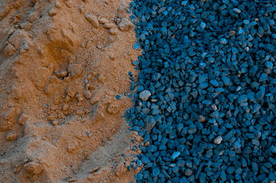 High angle view of gravel with sand