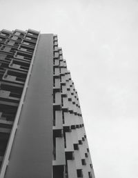 Low angle view of office building against sky