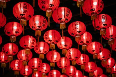 Low angle view of illuminated lanterns hanging