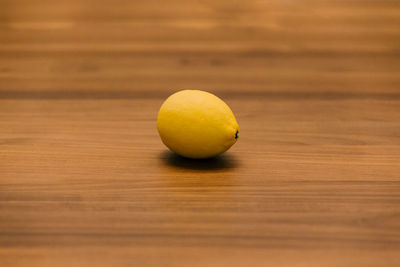 Close-up of lemon on table