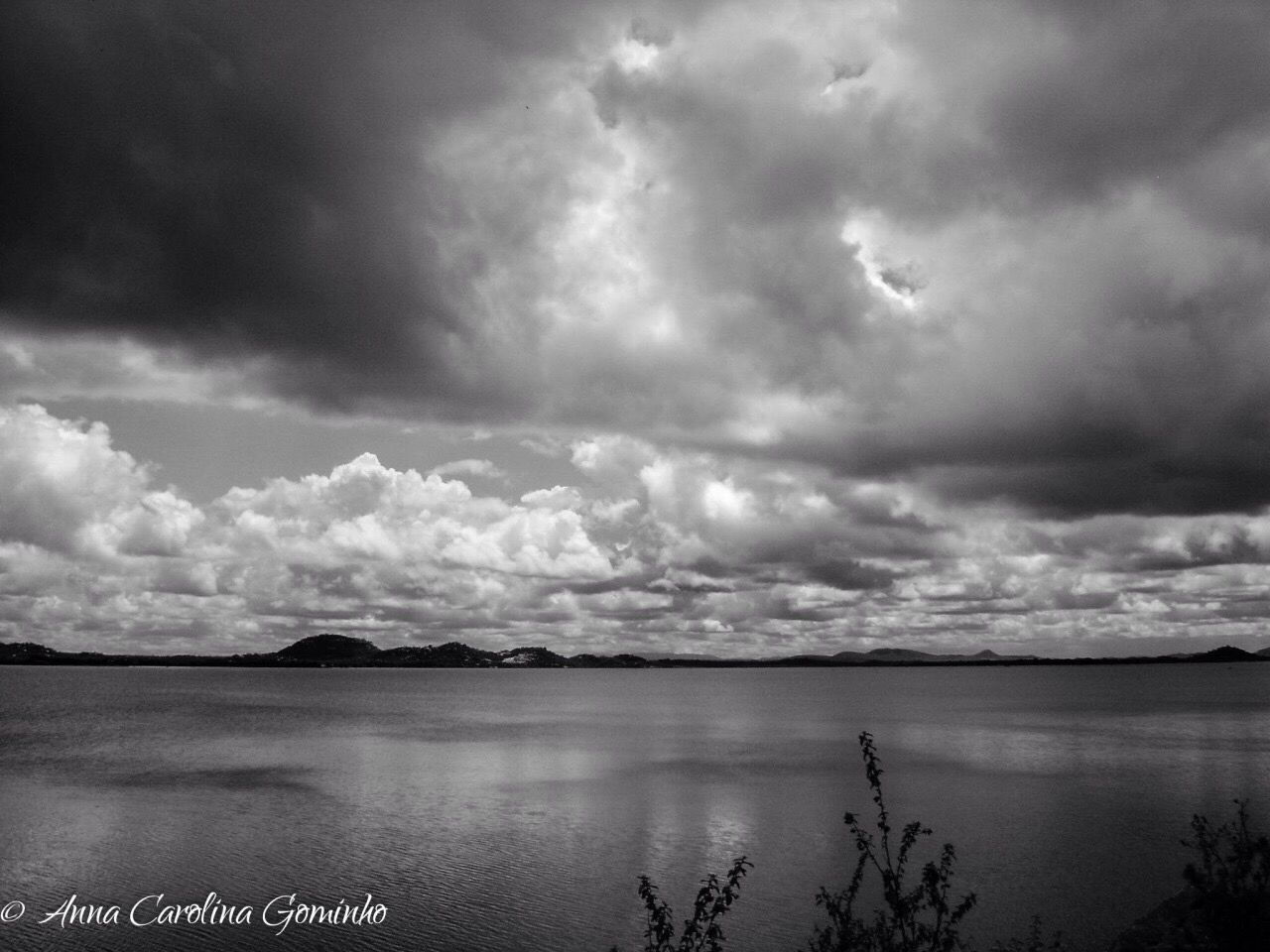 SCENIC VIEW OF CLOUDS OVER LAKE