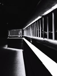 Empty walkway at night