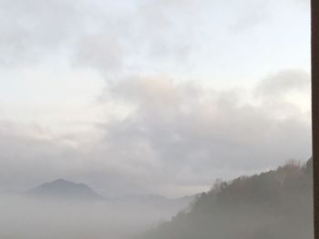 Low angle view of mountains against sky
