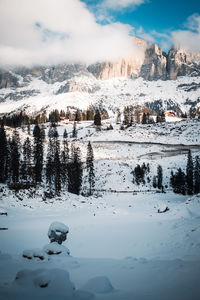 Scenic view of lake against sky during winter