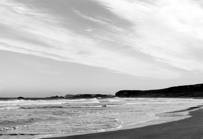 Scenic view of beach against sky