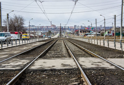 Railroad tracks against sky