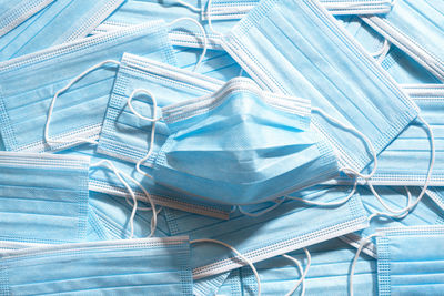 High angle view of blue papers