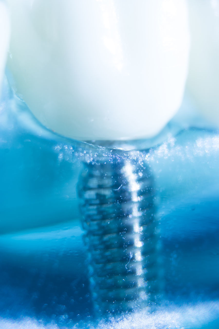 CLOSE-UP OF WATER IN SWIMMING POOL