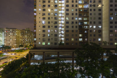 Buildings in city at night