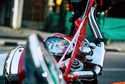 Close-up of motorcycle outdoors