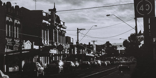 City street against cloudy sky