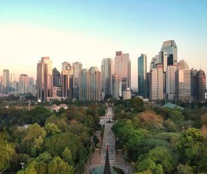 High angle view of buildings in city against sky