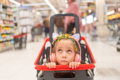 Portrait of boy sitting in car