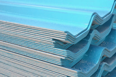 High angle view of metallic structure at beach against sky