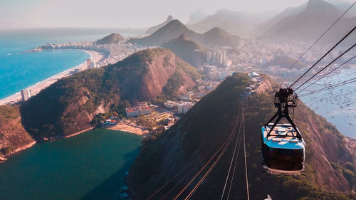 High angle view of cable car against mountain