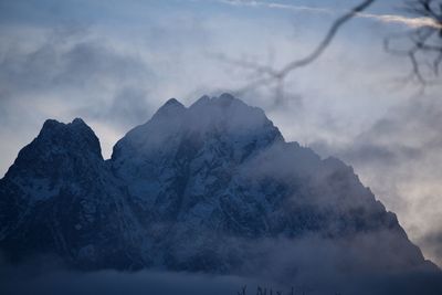 Scenic view of mountains against sky during winter