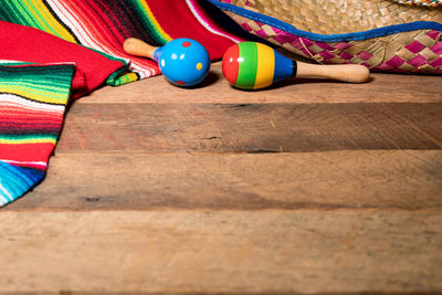 High angle view of multi colored balls on table