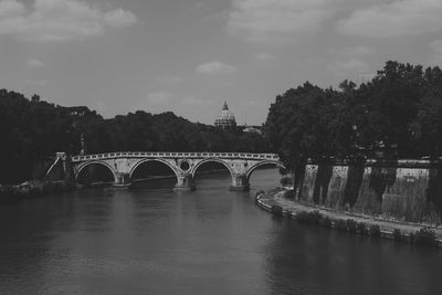 Bridge over river against sky