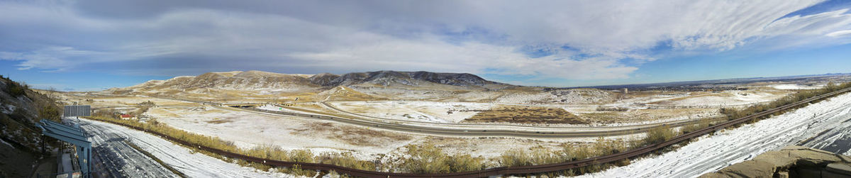 High angle view of snow covered road against sky