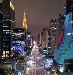 Illuminated buildings in city at night