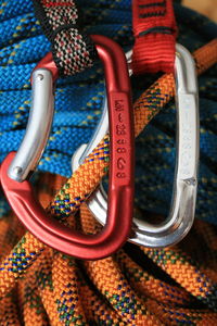 Close-up of climbing ropes connected by carabiners