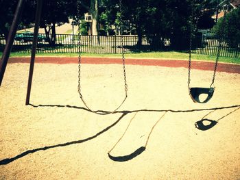 Close-up of swing in playground