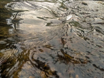 High angle view of water flowing in sea