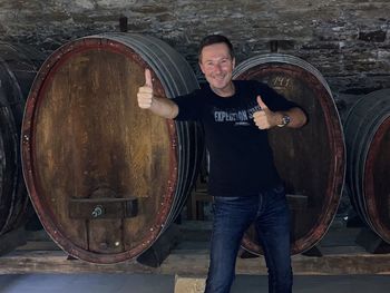 Portrait of man with camera