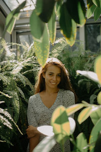 Portrait of smiling young woman outdoors