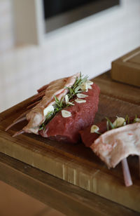 Close-up of lamb meat on cutting board