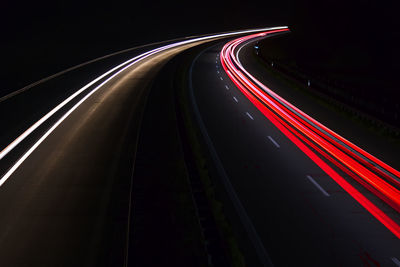 High angle view of light trails on highway