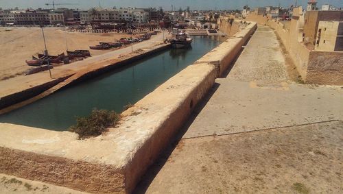 View of buildings in water