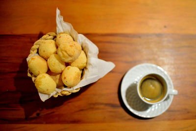 High angle view of coffee in cup on table