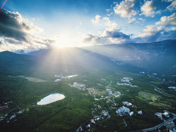 Scenic view of landscape against sky during sunset