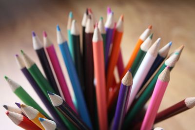 Close-up of colored pencils on table