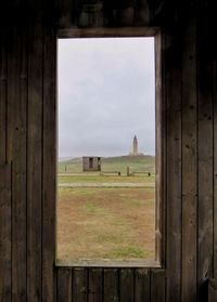 Abandoned building seen through window