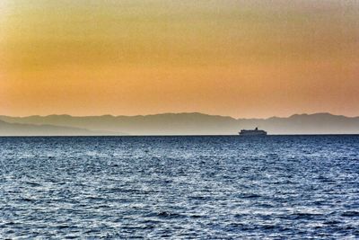 Scenic view of sea at sunset