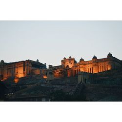 Buildings against clear sky