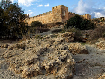View of historic building against cloudy sky