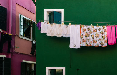 Clothes drying on clothesline in burano, venice, italy