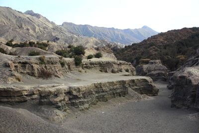 Scenic view of rocky mountains against sky