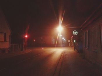 Illuminated street lights at night